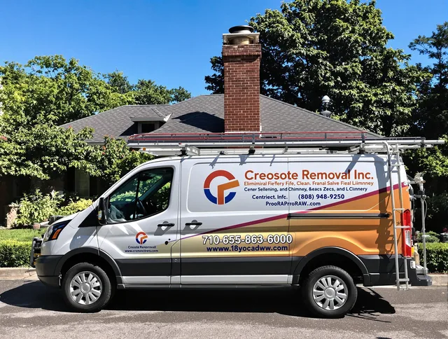 Whitman Chimney Sweep technician removing creosote safely in Whitman, MA