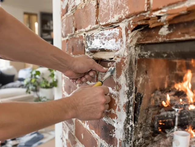 Routine fireplace repair by Whitman Chimney Sweep in Whitman, MA